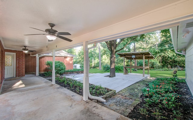 view of patio featuring ceiling fan