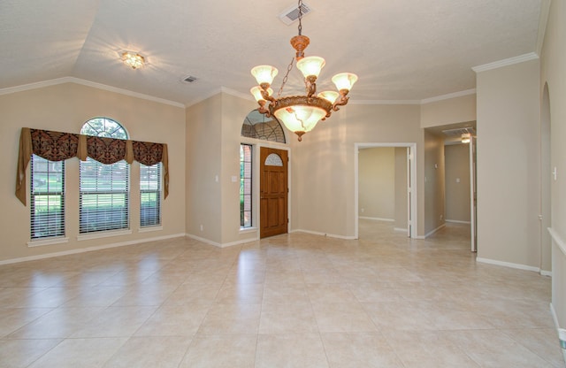 tiled foyer entrance featuring crown molding, vaulted ceiling, and a chandelier