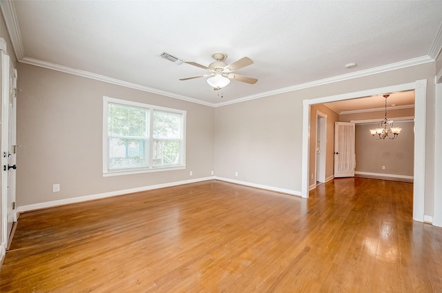 empty room featuring visible vents, ornamental molding, baseboards, light wood-style flooring, and ceiling fan with notable chandelier