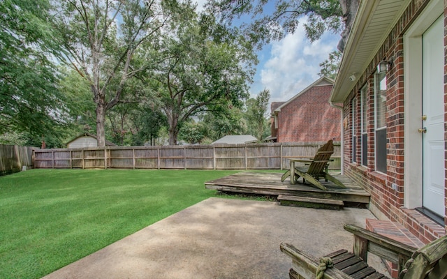 view of yard with a wooden deck