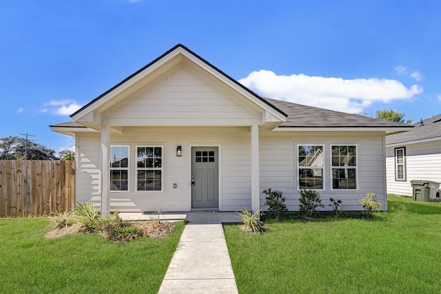 bungalow with a front yard