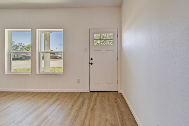 foyer featuring light wood-type flooring