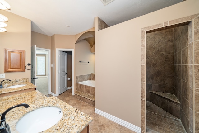 bathroom featuring separate shower and tub and vanity