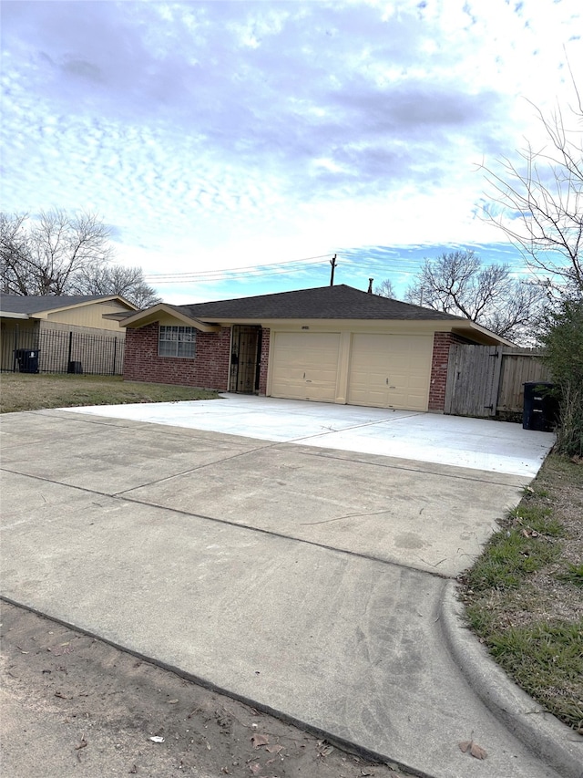 single story home with a garage