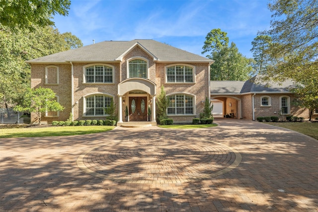 view of front of property with a garage