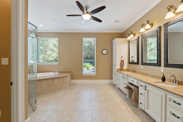 bathroom featuring vanity, crown molding, and separate shower and tub