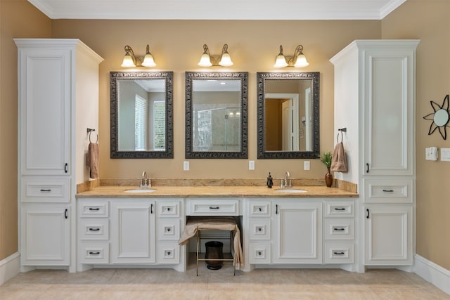 bathroom with vanity, tile patterned floors, and ornamental molding