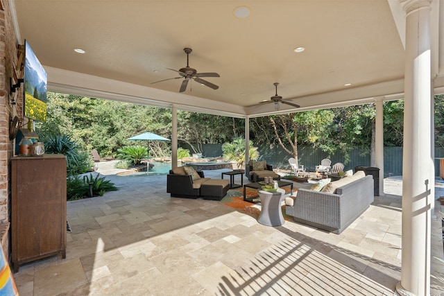 view of patio / terrace with ceiling fan and an outdoor hangout area