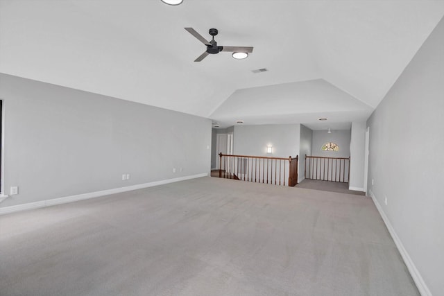 816 Lake Rd, Lake Jackson, TX 77566 - carpeted spare room with a ceiling fan, lofted ceiling, and baseboards