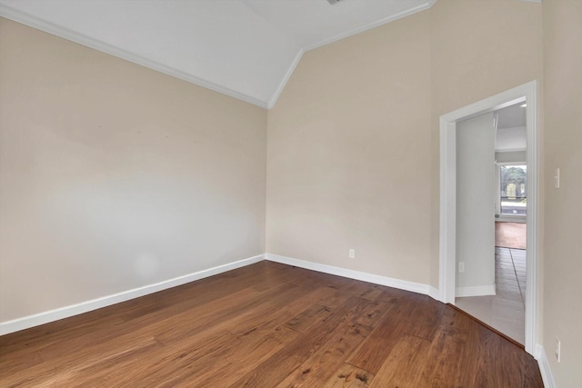 816 Lake Rd, Lake Jackson, TX 77566 - empty room with ornamental molding, lofted ceiling, baseboards, and wood finished floors