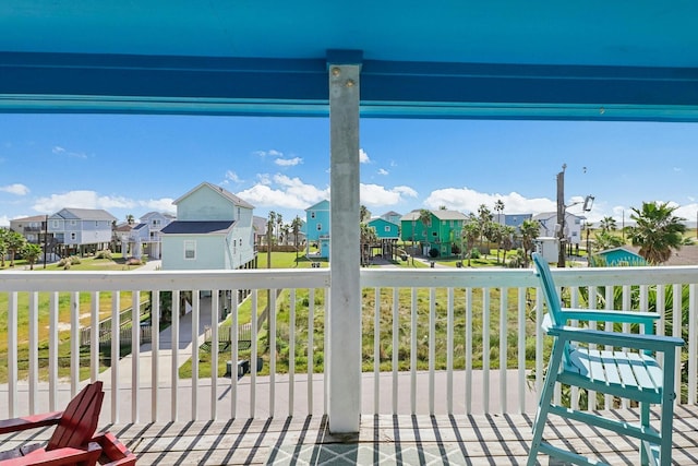 11218 Reagor Way, Galveston, TX 77554 - wooden deck with a residential view