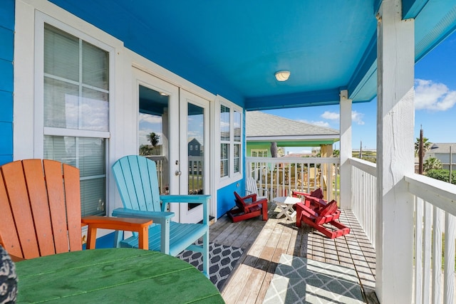 balcony featuring french doors