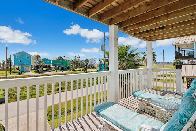 11218 Reagor Way, Galveston, TX 77554 - porch featuring a residential view