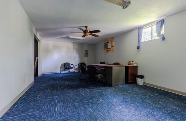 office area featuring a textured ceiling, electric panel, and ceiling fan