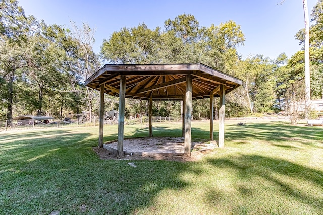 view of home's community with a gazebo and a lawn