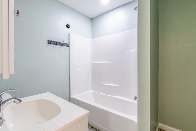 bathroom featuring vanity and shower / bathing tub combination