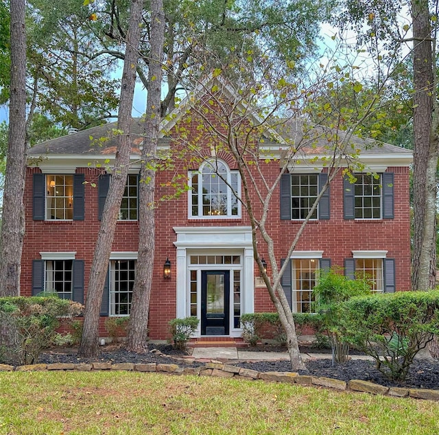 colonial house with a front lawn