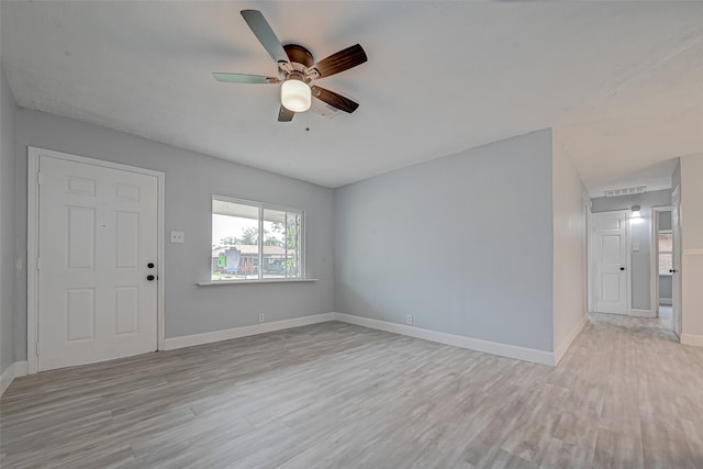 unfurnished living room with light hardwood / wood-style floors and ceiling fan