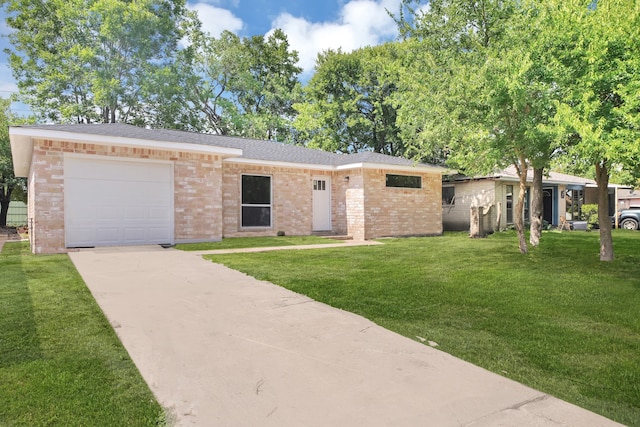 ranch-style home with a front lawn and a garage