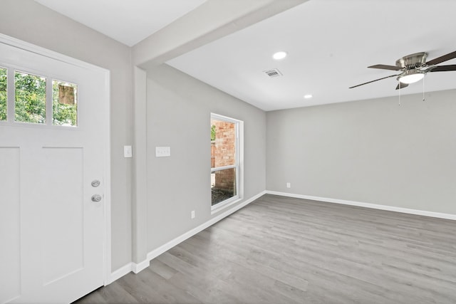 foyer entrance featuring ceiling fan and hardwood / wood-style floors