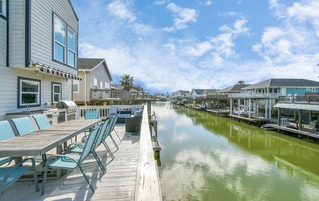 view of dock with a water view