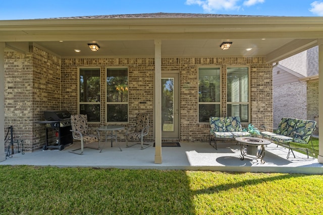 view of patio / terrace featuring an outdoor hangout area and grilling area