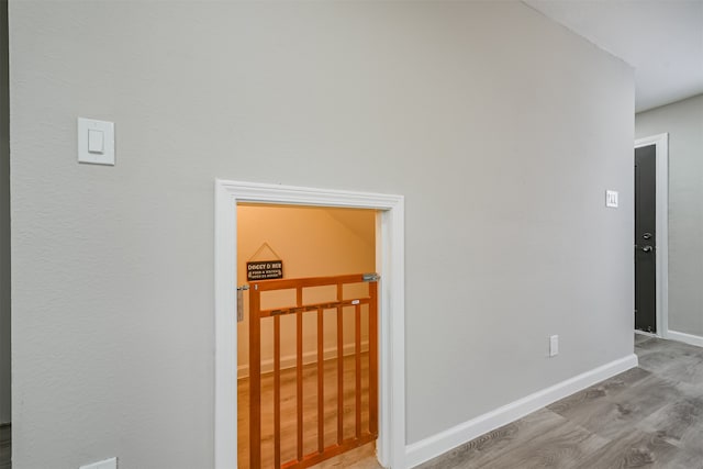 corridor featuring light hardwood / wood-style floors