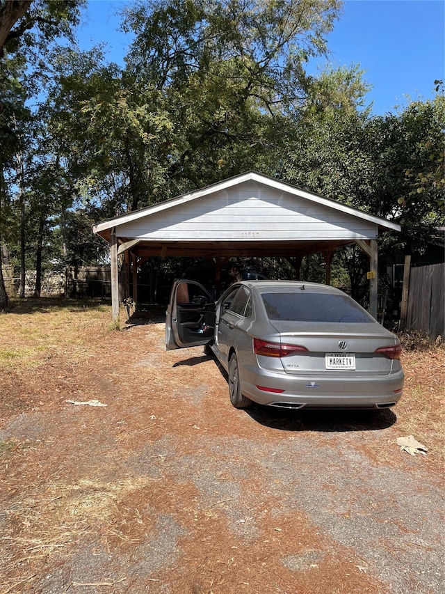 view of car parking featuring a carport