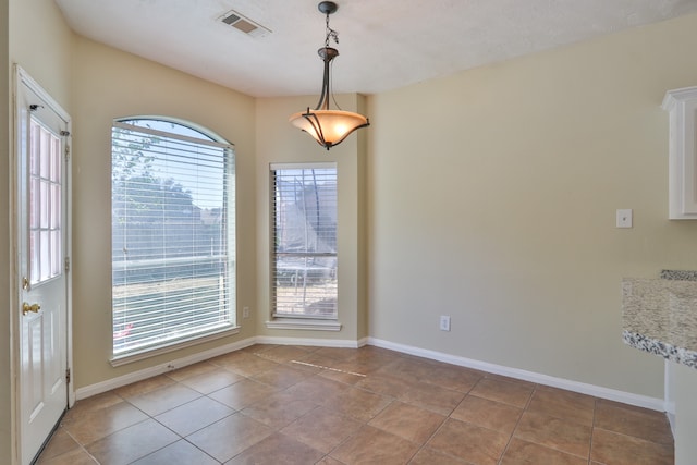 view of tiled empty room