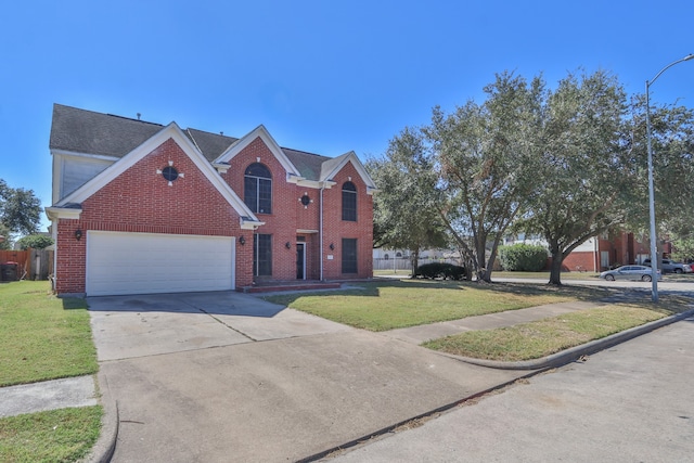 front facade with a garage and a front lawn