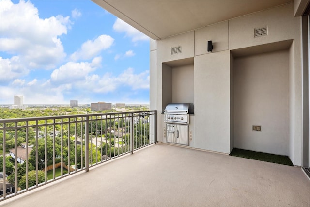 balcony with grilling area and visible vents