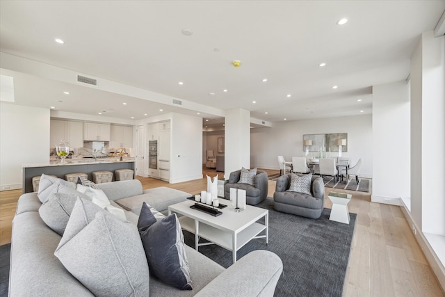 living room with light wood-type flooring