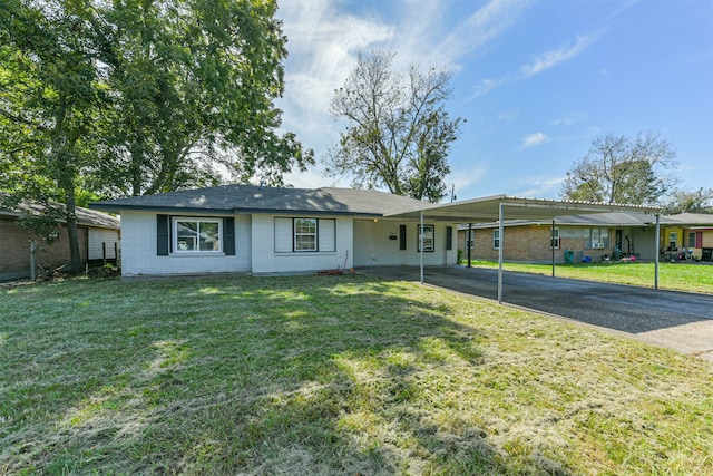 single story home with a carport and a front yard