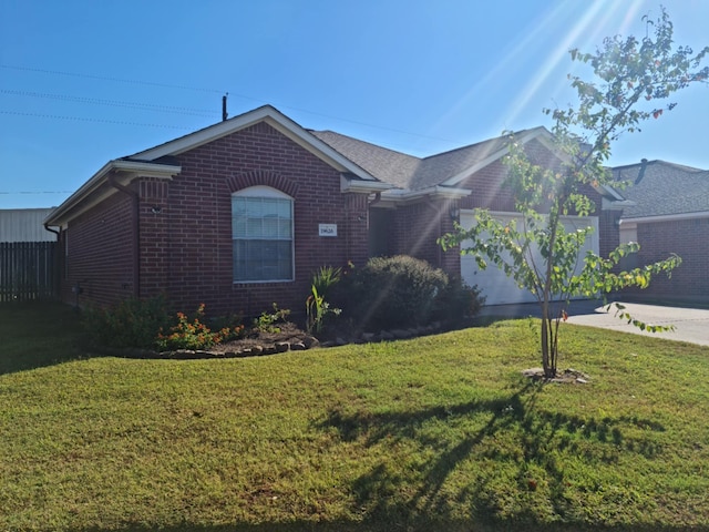 19626 Tularosa Ln, Tomball, TX 77377 - ranch-style home featuring brick siding, concrete driveway, a front lawn, and an attached garage