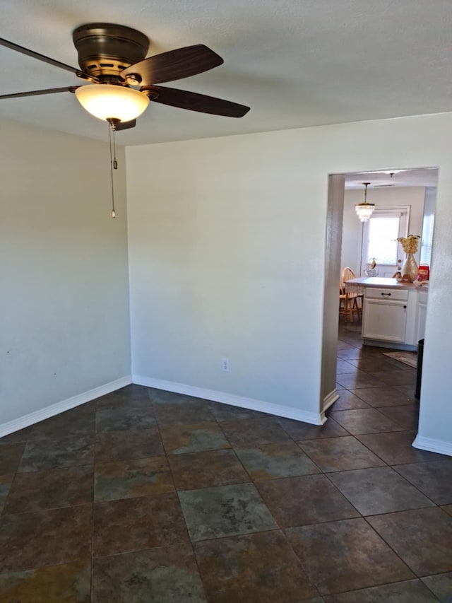 19626 Tularosa Ln, Tomball, TX 77377 - empty room featuring ceiling fan and baseboards
