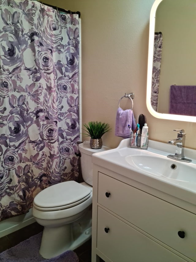 19626 Tularosa Ln, Tomball, TX 77377 - bathroom featuring vanity, toilet, and curtained shower