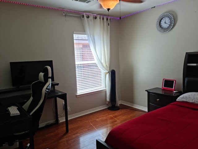 19626 Tularosa Ln, Tomball, TX 77377 - bedroom featuring wood finished floors, baseboards, and a ceiling fan