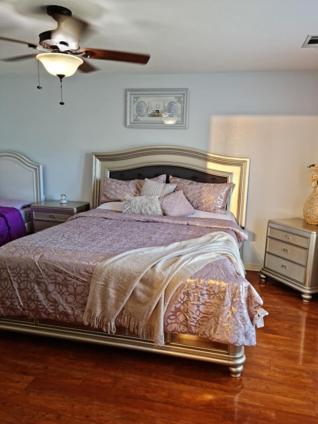 19626 Tularosa Ln, Tomball, TX 77377 - bedroom featuring wood finished floors and ceiling fan