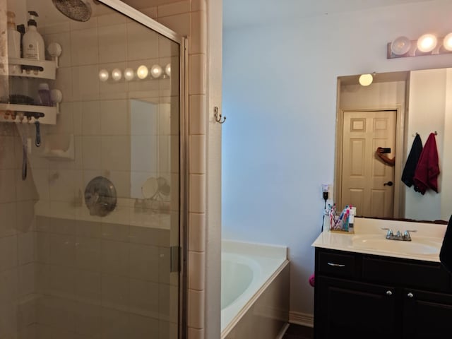 19626 Tularosa Ln, Tomball, TX 77377 - bathroom featuring a bath, vanity, and a stall shower