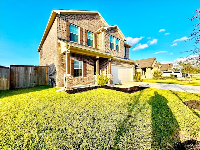 view of front of home featuring a front lawn and a garage