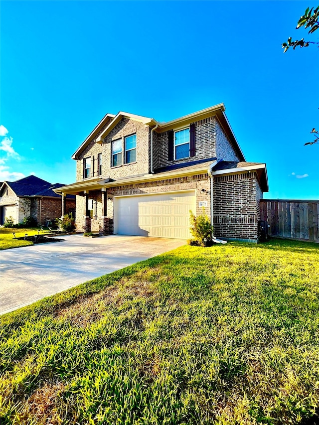 view of front facade with a front lawn and a garage