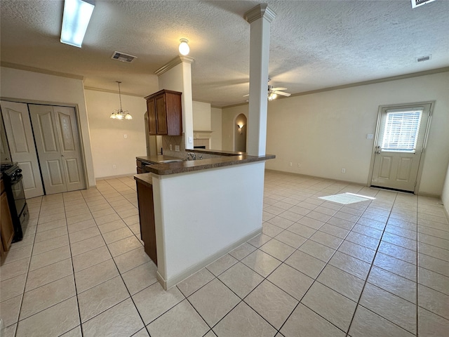 kitchen featuring light tile patterned floors, kitchen peninsula, ceiling fan with notable chandelier, and black range oven