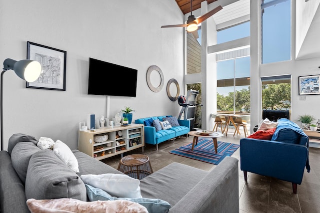 living room featuring high vaulted ceiling and ceiling fan