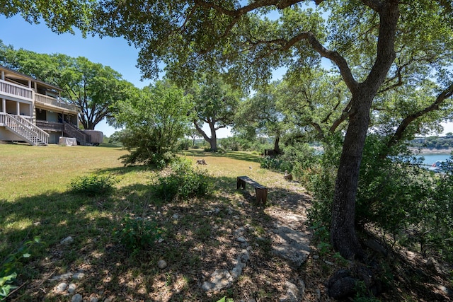 view of yard with a wooden deck