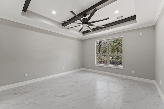 unfurnished room featuring crown molding, a raised ceiling, and ceiling fan