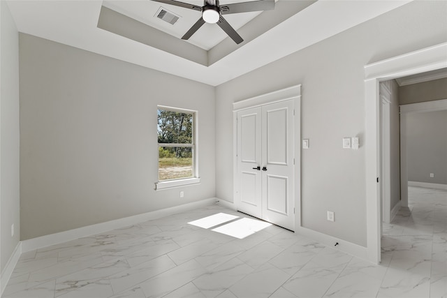 unfurnished bedroom with a closet and ceiling fan