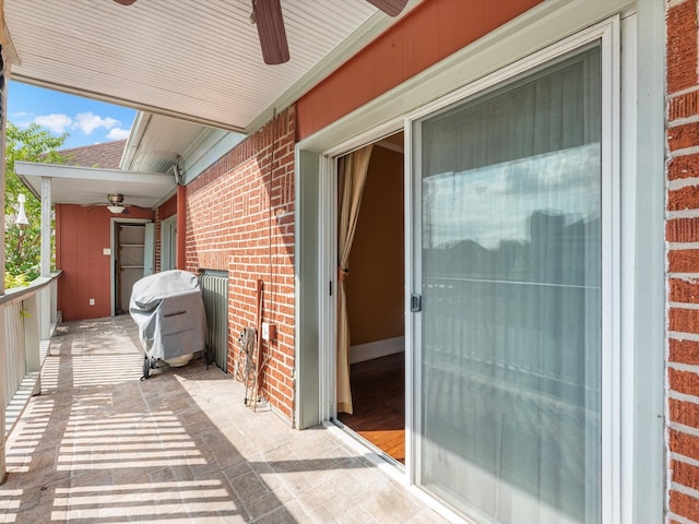 view of patio / terrace with grilling area and ceiling fan