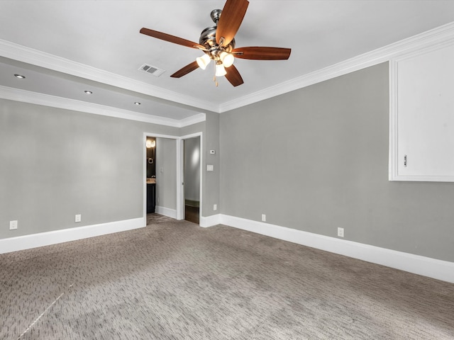 carpeted empty room with ceiling fan and crown molding