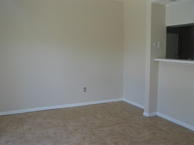 view of tiled empty room