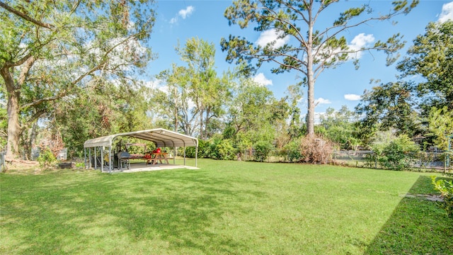 view of yard featuring a carport